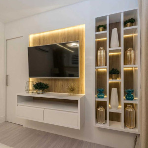 قفسه بندی دیوار پشت تلویزیون با کناف در نشیمن مدرن