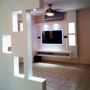 طراحی دیوار پشت تلویزیون با کناف و نور مخفی آبی