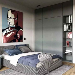 اتاق خواب پسرانه جوان مدرن سبز قرمز با تابلو دکوری و تم سینمایی