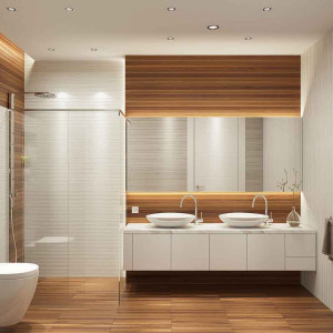 حمام و سرویس بهداشتی مدرن با کفپوش طرح چوب و اتاق دوش شیشه ای و روشویی کابینت دار سفید