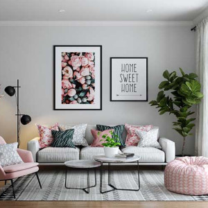 دکوراسیون طوسی و صورتی نشیمن با مبل و دیوارهای طوسی و کوسن و تابلو دکوری صورتی