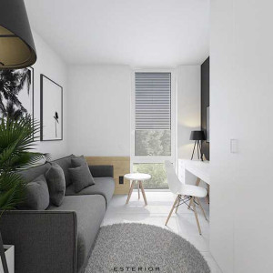 دکوراسیون طوسی و سفید اتاق کوچک با مبل طوسی تیره و دیوارهای سفید